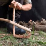 Starting A Fire With A Bow Drill